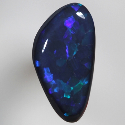 SOLID BLACK OPAL Flags of bright turquoise over royal blue
